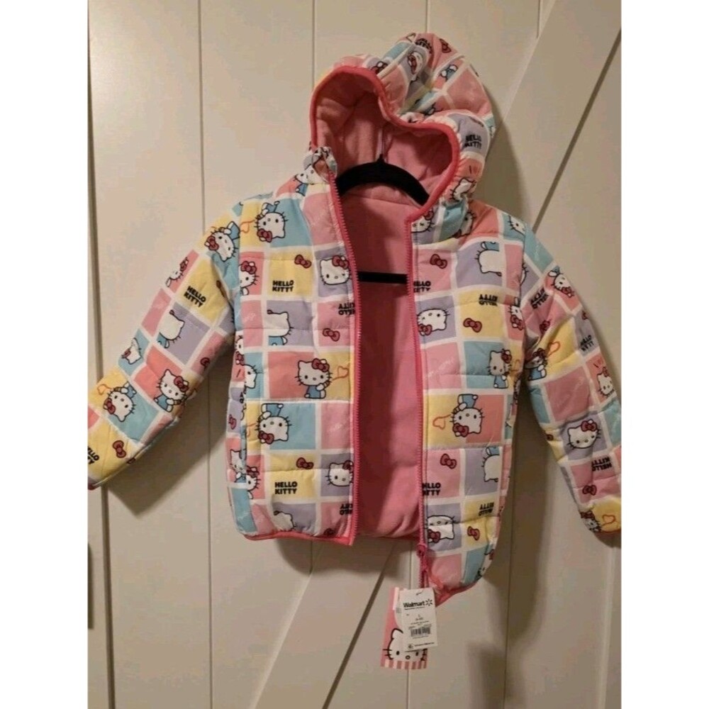 Hello kitty girl's puffer jacket size 6X pink Reversible fleece lined
